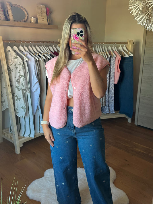 Gilet moumoute rose avec pressions